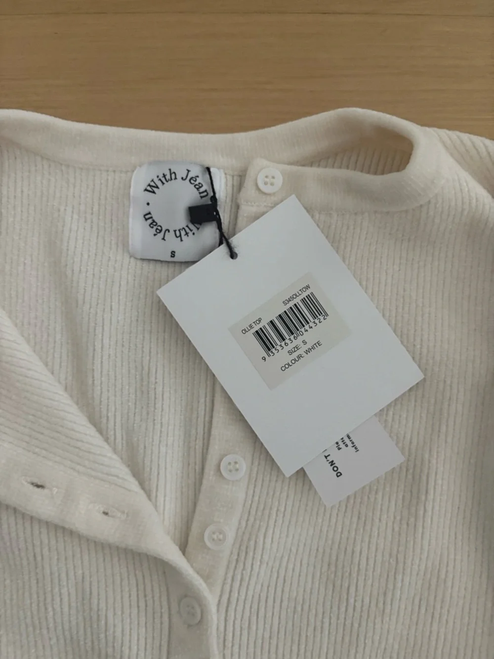 With Jean, Cropped White Ribbed Button-Up Cardigan with Black Trim - Picture 3 of 4